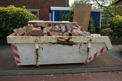Professional team conducting office clearance in a modern Purley office